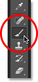 Selecting the Brush Tool from the Tools panel. 