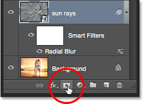 Clicking the Layer Mask icon in the Layers panel. 