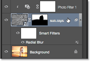 Selecting the sun rays layer in the Layers panel. 