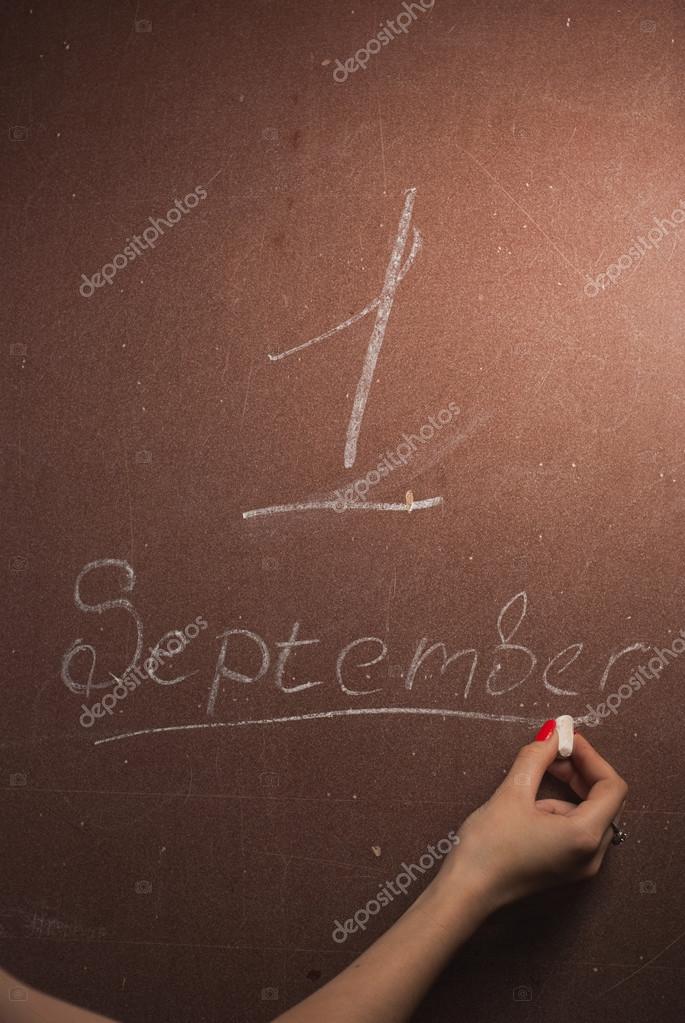 depositphotos 114348422 stock photo chalkboard with september 1 written